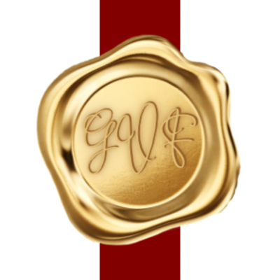 Gold wax seal with initials on a red ribbon